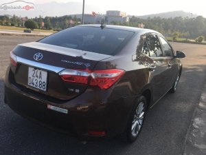 Toyota Corolla Altis AT 1.8G 2014 - Bán Toyota Corolla altis AT 1.8G sản xuất 2014, màu nâu, giá 650tr