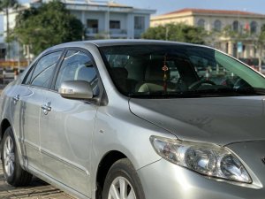 Toyota Corolla Altis G 2010 - Cần bán Toyota Corolla altis G đời 2010, màu bạc