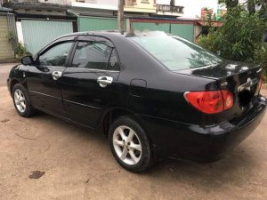 Toyota Corolla Altis 1.8G MT 2003 - Bán Toyota Corolla altis 1.8G MT đời 2003, màu đen số sàn, giá chỉ 243 triệu