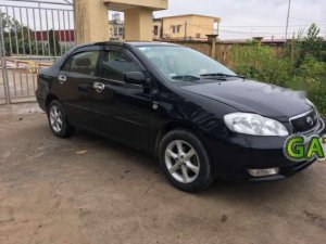 Toyota Corolla Altis 1.8G MT 2003 - Bán Toyota Corolla altis 1.8G MT đời 2003, màu đen số sàn, giá chỉ 243 triệu