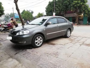 Toyota Corolla Altis 1.8G MT 2005 - Cần bán gấp Toyota Corolla altis 1.8G MT sản xuất 2005, màu xám