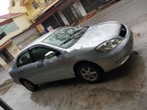 Toyota Corolla Altis 1.8G MT 2003 - Bán Toyota Corolla Altis 1.8G MT sản xuất năm 2003, màu bạc, tất cả chức năng hoạt động tốt 