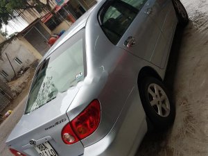 Toyota Corolla Altis 1.8G MT 2003 - Bán Toyota Corolla Altis 1.8G MT sản xuất năm 2003, màu bạc, tất cả chức năng hoạt động tốt 