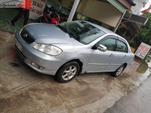 Toyota Corolla Altis 1.8G MT 2003 - Bán Toyota Corolla Altis 1.8G MT sản xuất năm 2003, màu bạc, tất cả chức năng hoạt động tốt 