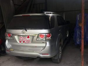 Toyota Fortuner 2014 - Cần bán gấp Toyota Fortuner sản xuất năm 2014, màu bạc chính chủ, giá tốt