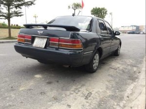 Toyota Corona  GLi 1.5   1990 - Cần bán lại Toyota Corona GLi 1.5 đời 1990, màu đen, xe nhập khẩu