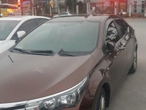 Toyota Corolla Altis 1.8G MT 2015 - Bán Toyota Corolla altis 1.8G MT đời 2015, màu nâu, đẹp như mới