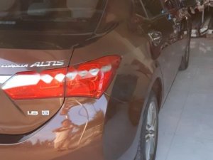 Toyota Corolla Altis 1.8G MT 2015 - Bán Toyota Corolla altis 1.8G MT đời 2015, màu nâu, đẹp như mới