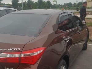 Toyota Corolla Altis 1.8G MT 2015 - Bán Toyota Corolla altis 1.8G MT đời 2015, màu nâu, đẹp như mới