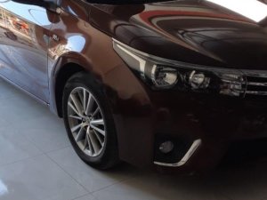 Toyota Corolla Altis 1.8G MT 2015 - Bán Toyota Corolla altis 1.8G MT đời 2015, màu nâu, đẹp như mới