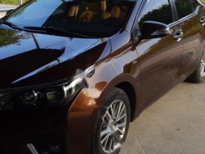 Toyota Corolla Altis 1.8G MT 2015 - Bán Toyota Corolla altis 1.8G MT đời 2015, màu nâu, đẹp như mới