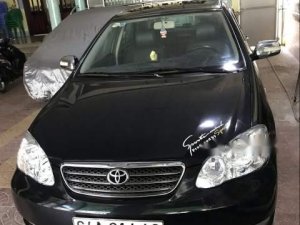 Toyota Corolla Altis 2004 - Bán Toyota Corolla altis sản xuất 2004, màu đen xe gia đình