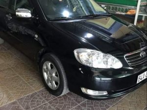 Toyota Corolla Altis 2004 - Bán Toyota Corolla altis sản xuất 2004, màu đen xe gia đình