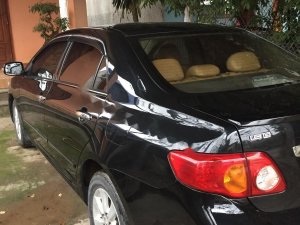 Toyota Corolla Altis 2009 - Cần bán xe Toyota Corolla altis năm 2009, màu đen, giá tốt