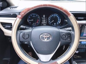 Toyota Corolla Altis   2016 - Mình cần bán Toyota Corolla Altis số tự động, lốp theo xe của hãng còn