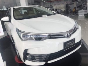 Toyota Corolla Altis 2019 - Bán Toyota Corolla Altis năm sản xuất 2019, màu trắng, 700 triệu