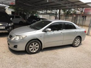 Toyota Corolla Altis 1.8G MT 2009 - Bán Toyota Corolla altis 1.8G MT 2009, màu bạc như mới  