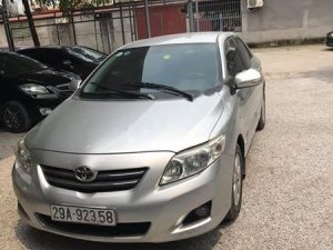 Toyota Corolla Altis 1.8G MT 2009 - Bán Toyota Corolla altis 1.8G MT 2009, màu bạc như mới  