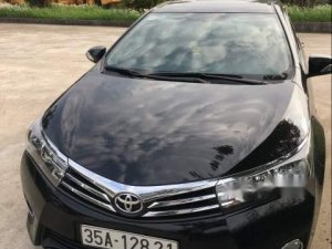 Toyota Corolla Altis 2014 - Cần bán xe Toyota Corolla altis sản xuất năm 2014, màu đen