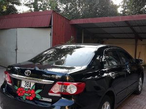 Toyota Corolla Altis G 2014 - Bán xe Toyota Corolla Altis G sản xuất năm 2014, màu đen chính chủ, giá 635tr