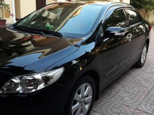 Toyota Corolla Altis G 2014 - Bán xe Toyota Corolla Altis G sản xuất năm 2014, màu đen chính chủ, giá 635tr