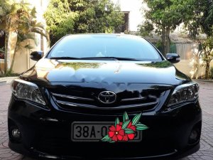 Toyota Corolla Altis G 2014 - Bán xe Toyota Corolla Altis G sản xuất năm 2014, màu đen chính chủ, giá 635tr