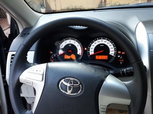 Toyota Corolla Altis G 2014 - Bán xe Toyota Corolla Altis G sản xuất năm 2014, màu đen chính chủ, giá 635tr
