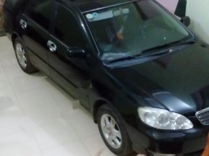 Toyota Corolla Altis 2004 - Cần bán Toyota Corolla Altis năm 2004, màu đen xe gia đình, 265tr