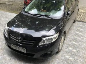 Toyota Corolla Altis 2010 - Bán Toyota Corolla Altis đời 2010, màu đen xe gia đình