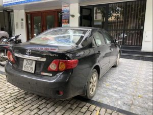 Toyota Corolla Altis 2010 - Bán Toyota Corolla Altis đời 2010, màu đen xe gia đình