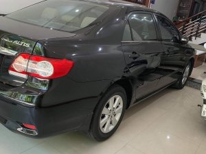 Toyota Corolla Altis 2011 - Cần bán Toyota Corolla altis đời 2011, màu đen chính chủ