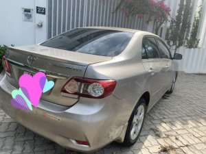 Toyota Corolla Altis   2011 - Bán Toyota Corolla altis 2011, màu vàng, xe nhập 