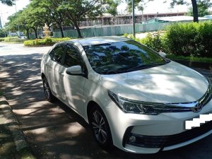 Toyota Corolla Altis 1.8G 2018 - Bán Toyota Altis 1.8G năm 2018, màu trắng, xe sử dụng rất ít, bán 740tr