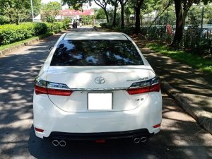 Toyota Corolla Altis 1.8G 2018 - Bán Toyota Altis 1.8G năm 2018, màu trắng, xe sử dụng rất ít, bán 740tr