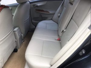 Toyota Corolla Altis   2010 - Cần bán gấp Toyota Corolla altis đời 2010, màu đen, nguyên bản, không đâm đụng va chạm