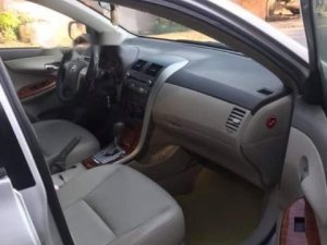 Toyota Corolla Altis   2010 - Bán xe Toyota Corolla altis năm sản xuất 2010, màu bạc, xe công chức sử dụng