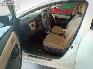 Toyota Corolla Altis 1.8G 2015 - Cần bán lại xe Toyota Corolla altis 1.8G đời 2015, màu trắng