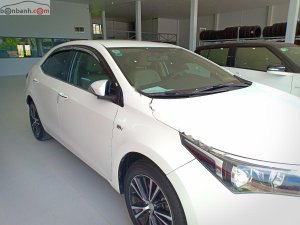 Toyota Corolla Altis 1.8G 2015 - Cần bán lại xe Toyota Corolla altis 1.8G đời 2015, màu trắng