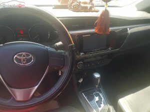 Toyota Corolla Altis 2015 - Cần bán gấp Toyota Corolla altis đời 2015, màu đen