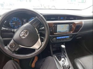 Toyota Corolla Altis 2016 - Bán Toyota Corolla altis năm 2016, màu nâu, giá 635tr