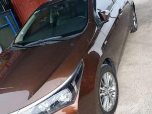 Toyota Corolla Altis 2016 - Bán Toyota Corolla altis năm 2016, màu nâu, giá 635tr