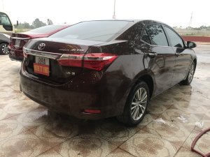 Toyota Corolla Altis 1.8G AT 2015 - Bán Toyota Corolla altis màu đồng 1.8 2015