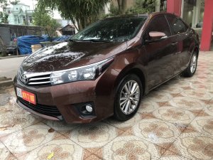 Toyota Corolla Altis 1.8G AT 2015 - Bán Toyota Corolla altis màu đồng 1.8 2015