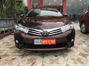 Toyota Corolla Altis 1.8G AT 2015 - Bán Toyota Corolla altis màu đồng 1.8 2015