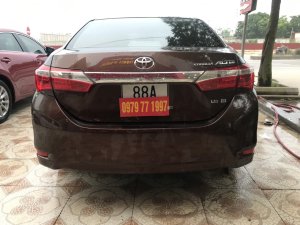 Toyota Corolla Altis 1.8G AT 2015 - Bán Toyota Corolla altis màu đồng 1.8 2015