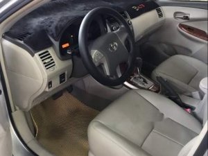 Toyota Corolla Altis 2009 - Cần bán gấp Toyota Corolla altis 2009, màu bạc số tự động