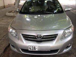 Toyota Corolla Altis 2009 - Cần bán gấp Toyota Corolla altis 2009, màu bạc số tự động