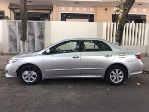 Toyota Corolla Altis 2009 - Cần bán gấp Toyota Corolla altis 2009, màu bạc số tự động