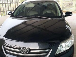 Toyota Corolla Altis   2009 - Cần bán xe Toyota Corolla altis đời 2009, màu đen