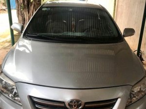 Toyota Corolla Altis 2010 - Bán Toyota Corolla altis sản xuất năm 2010, màu bạc số sàn, giá cạnh tranh